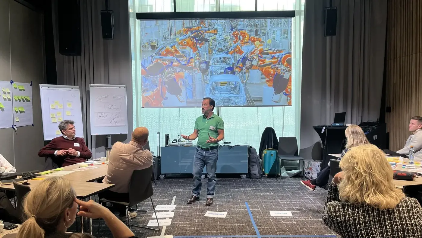 Alexey Krivitsky presenting a map at a bootcamp